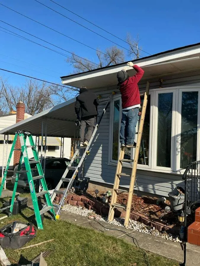 Restoration crew performing exterior repair in Ridley